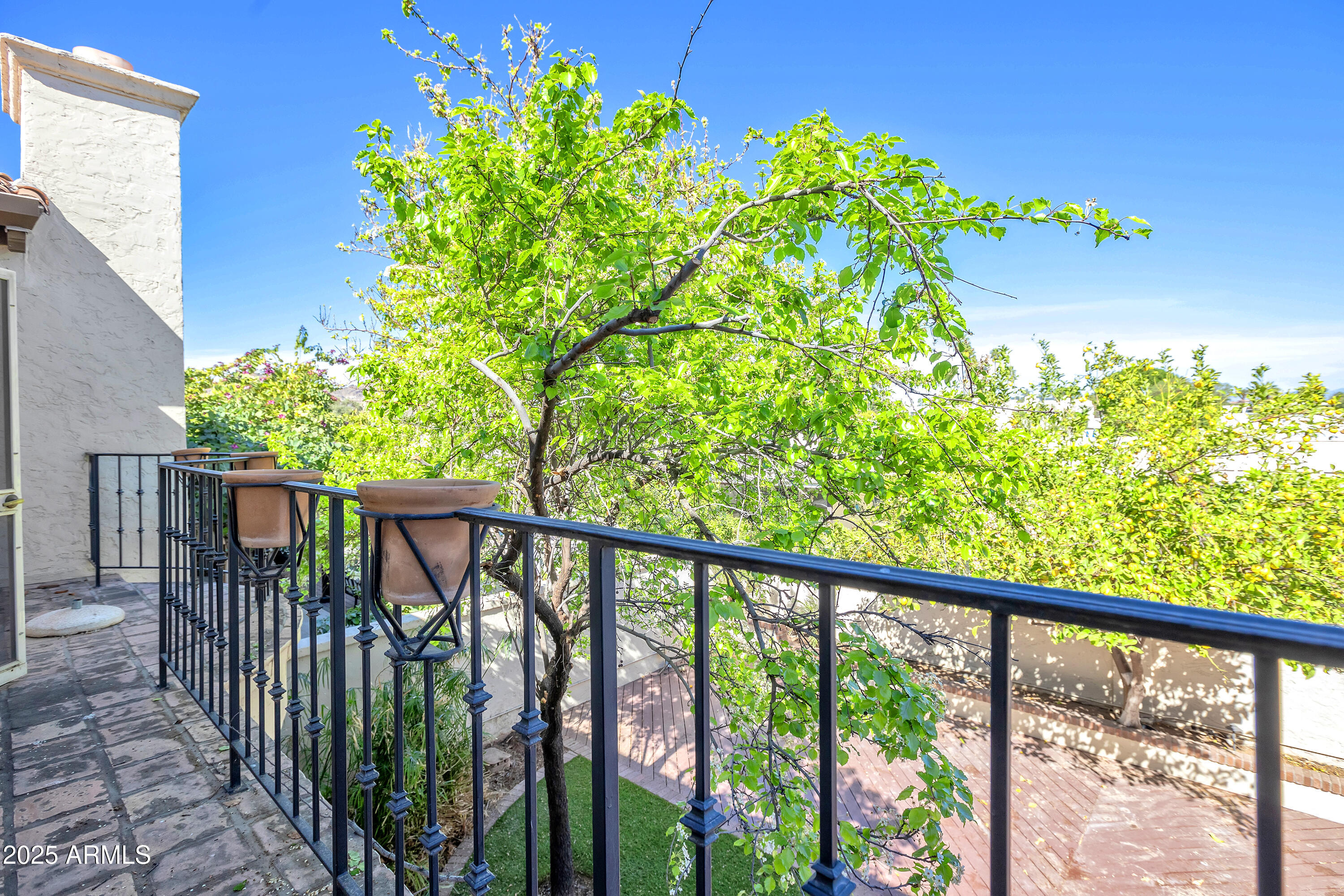 6701 North Scottsdale Road, Unit 23 Scottsdale, AZ 85250 - Photo 31 of 47 a city view from a balcony