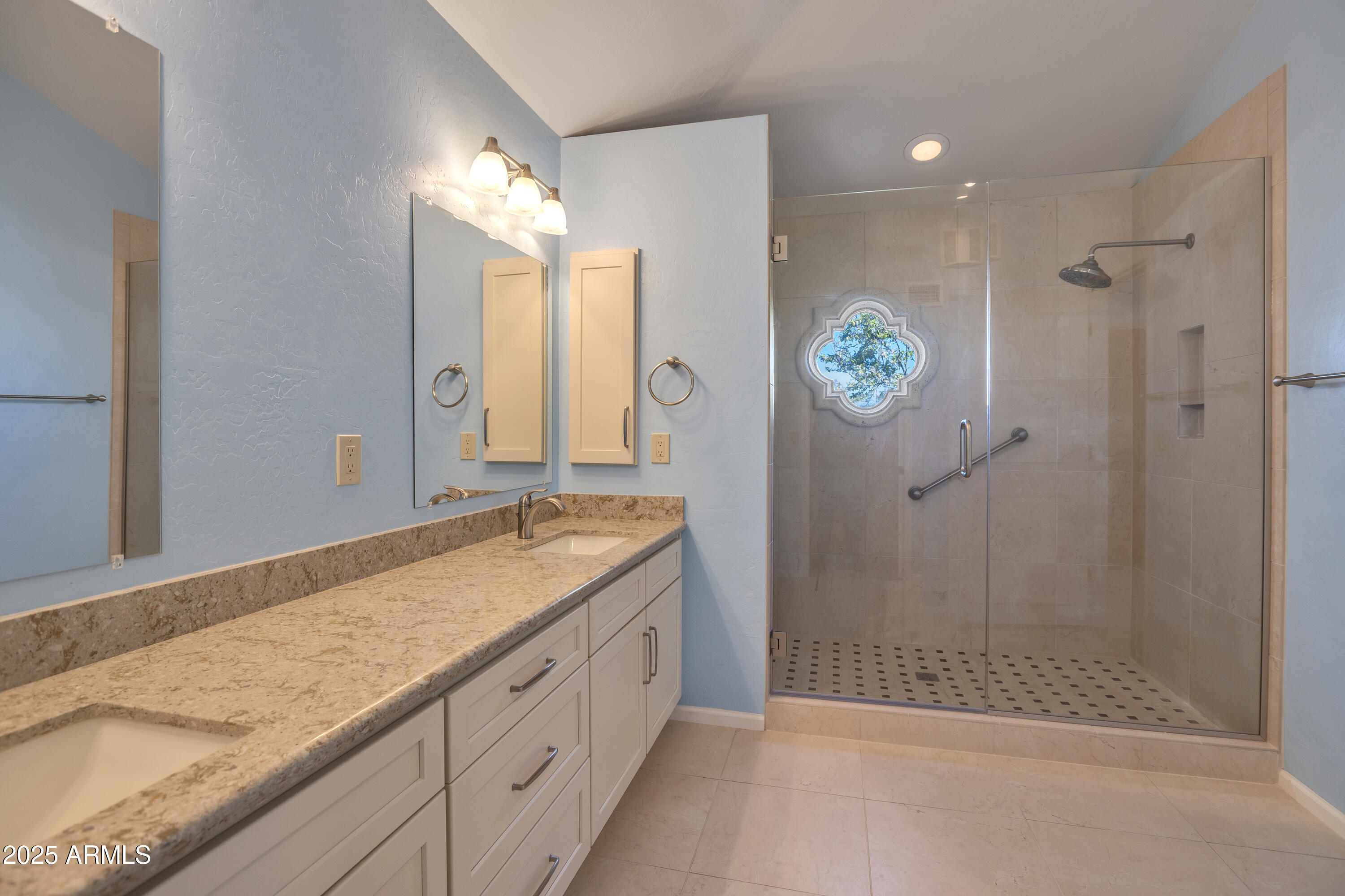 6701 North Scottsdale Road, Unit 23 Scottsdale, AZ 85250 - Photo 32 of 47 a spacious bathroom with a granite countertop sink mirror and shower