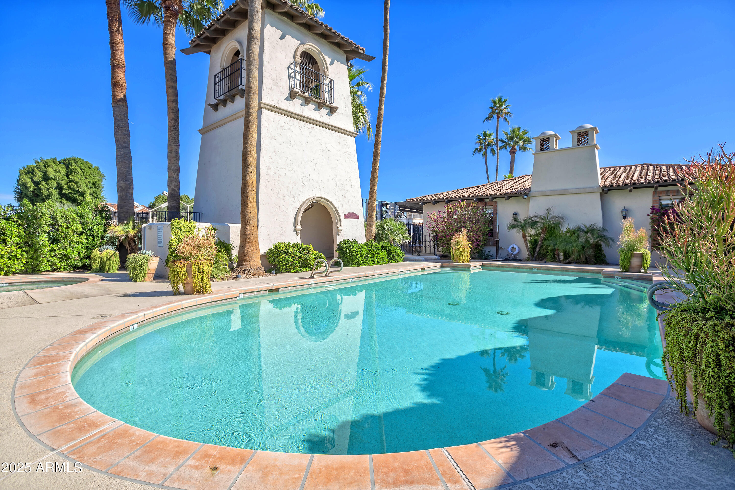 6701 North Scottsdale Road, Unit 23 Scottsdale, AZ 85250 - Photo 38 of 47 a view of a house with a swimming pool