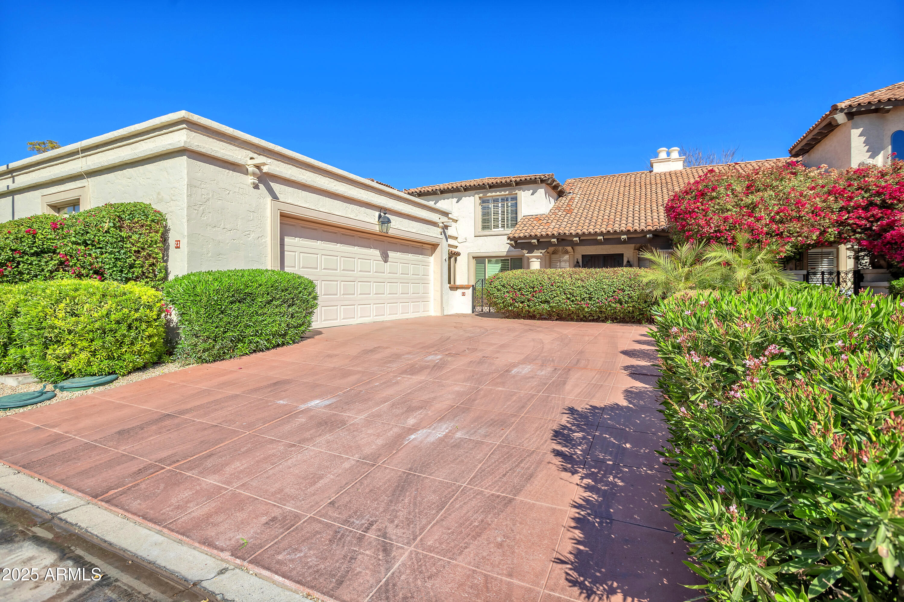 6701 North Scottsdale Road, Unit 23 Scottsdale, AZ 85250 - Photo 4 of 47 a view of a house with a yard