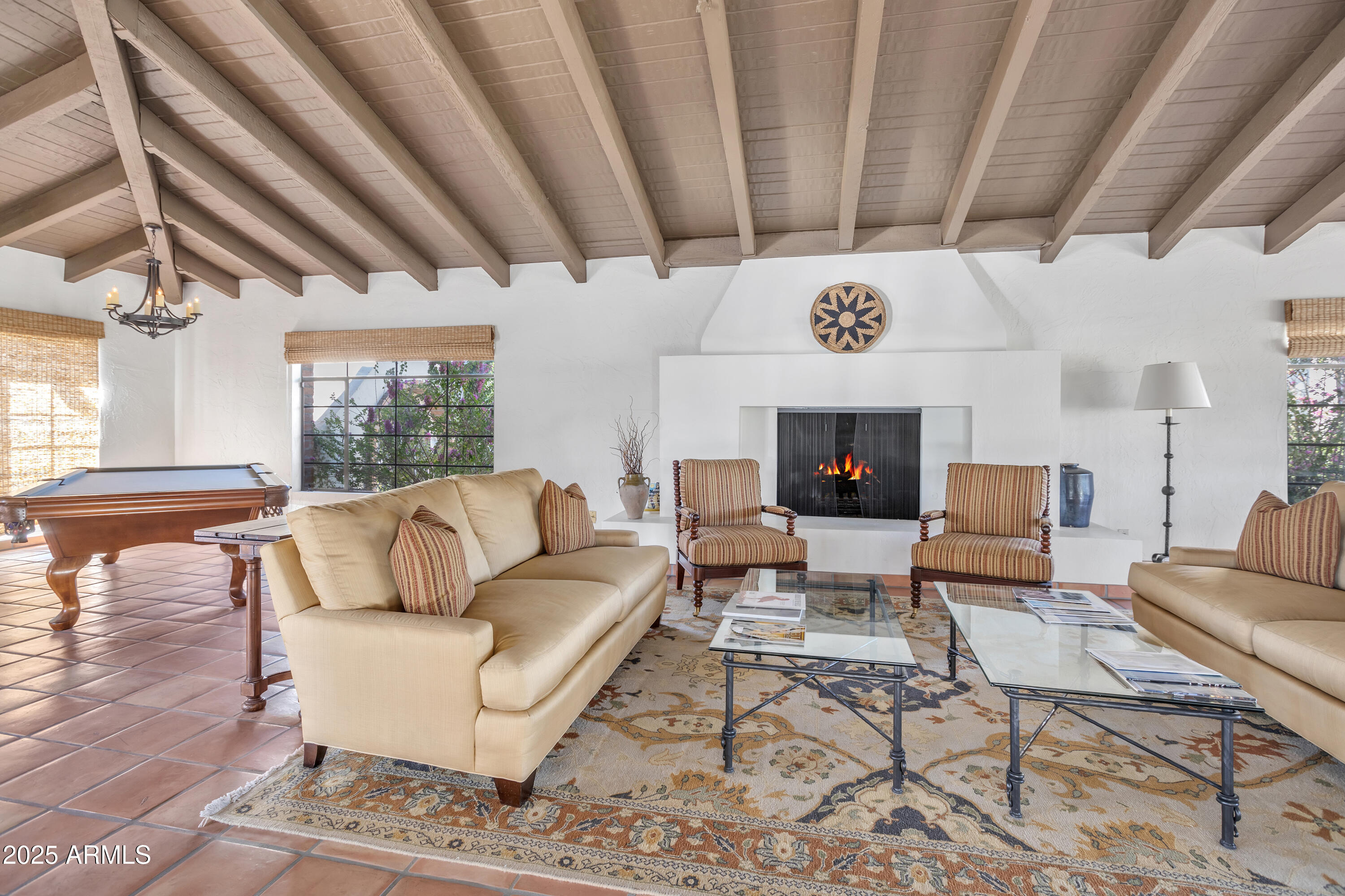 6701 North Scottsdale Road, Unit 23 Scottsdale, AZ 85250 - Photo 42 of 47 a living room with furniture and a fireplace