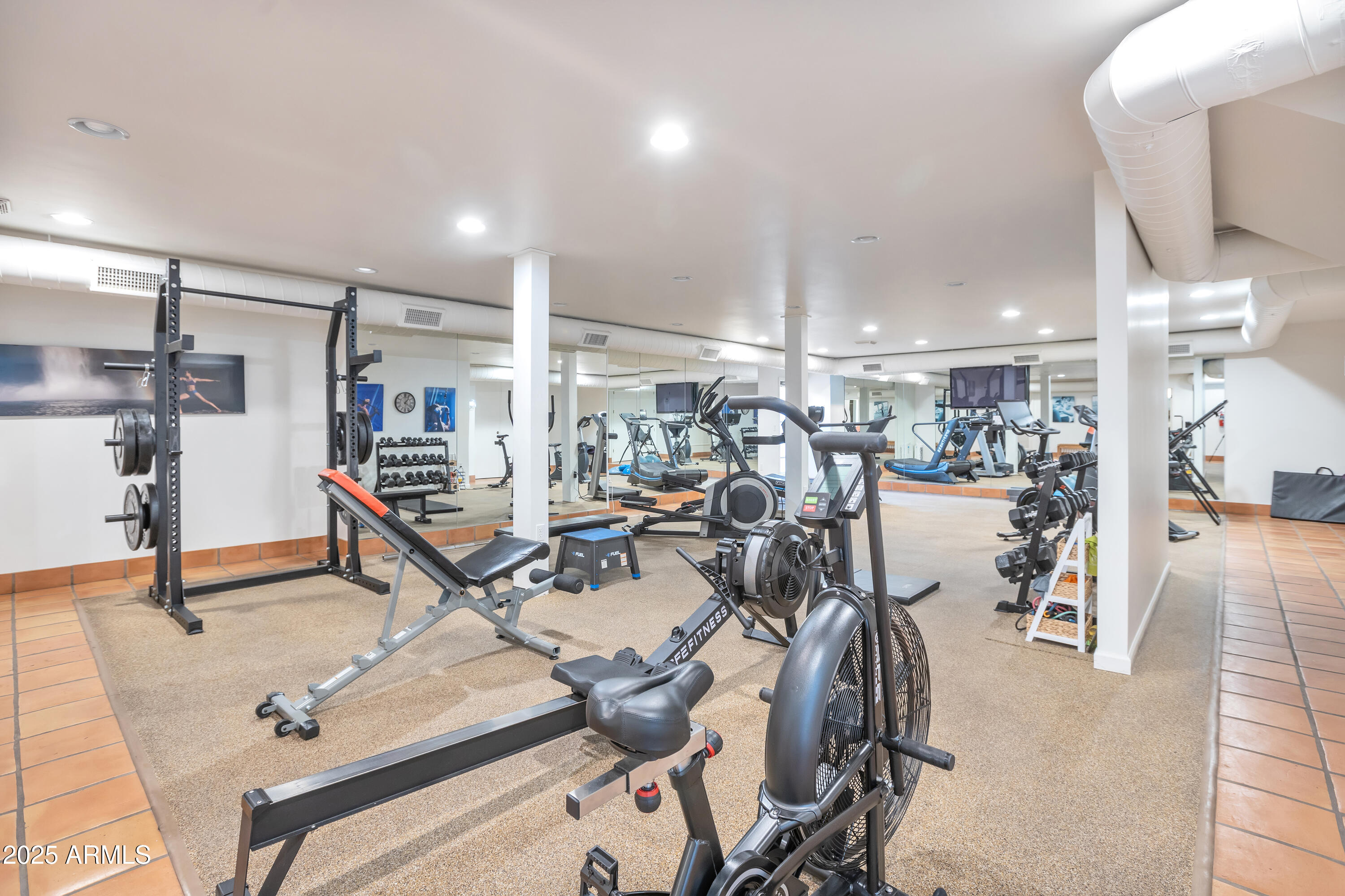 6701 North Scottsdale Road, Unit 23 Scottsdale, AZ 85250 - Photo 45 of 47 a view of a room with gym equipment