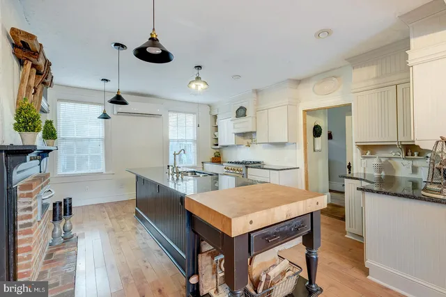 a bathroom with a sink a toilet and a bathtub