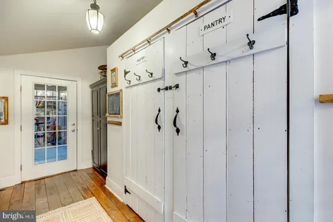 a backyard of a house with outdoor seating