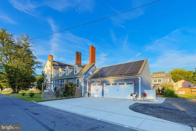 a view of living room with furniture and flat screen tv