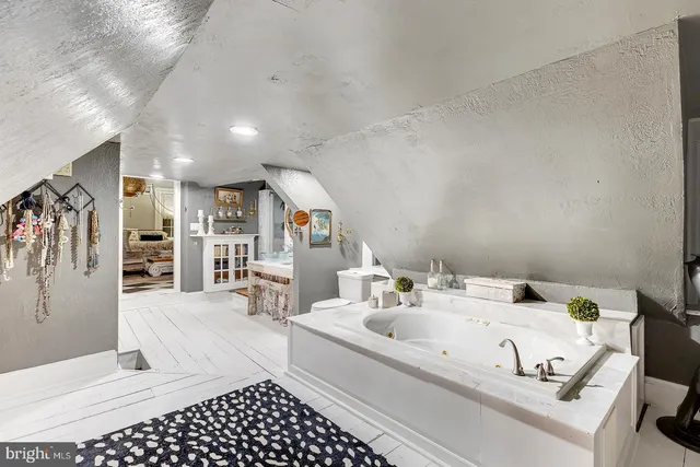 an aerial view of a house with swimming pool