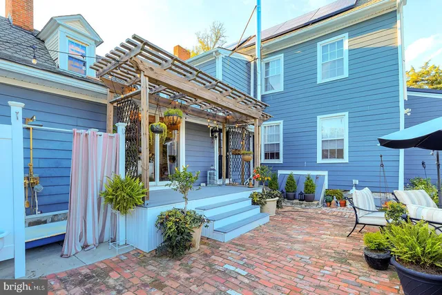 a kitchen with a refrigerator a sink and dishwasher