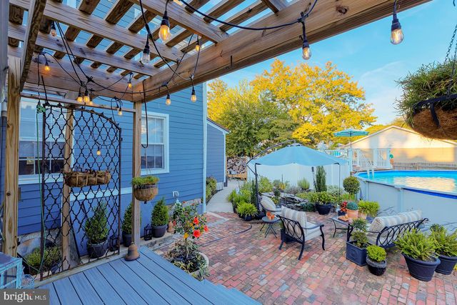 a kitchen with stainless steel appliances granite countertop a stove and a refrigerator