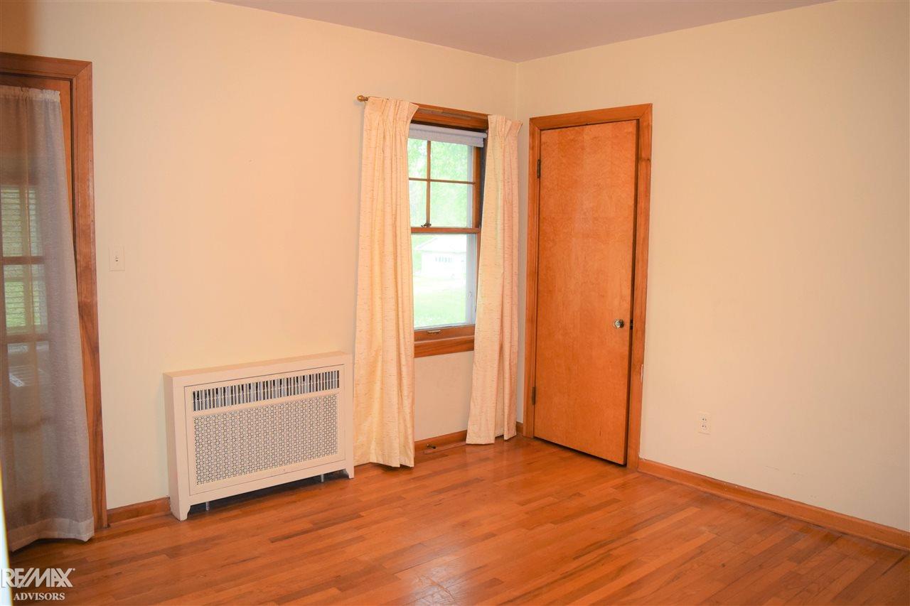 42430 Utica Road Sterling Heights, MI 48314 - Photo 25 of 44 BEDROOM 3 W DOOR TO PORCH