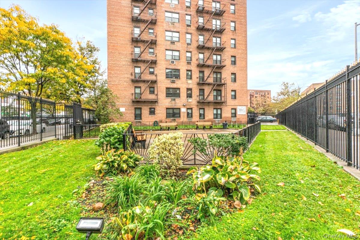 99-35 59th Avenue, Unit L5 Queens, NY 11368 - Photo 2 of 17 View of apartment building / complex