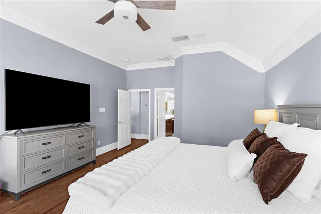 a bathroom with a sink vanity and mirror