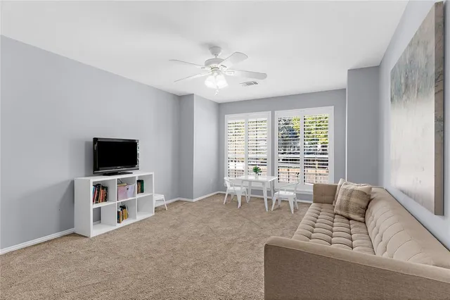 a bathroom with a granite countertop sink toilet and a bathtub