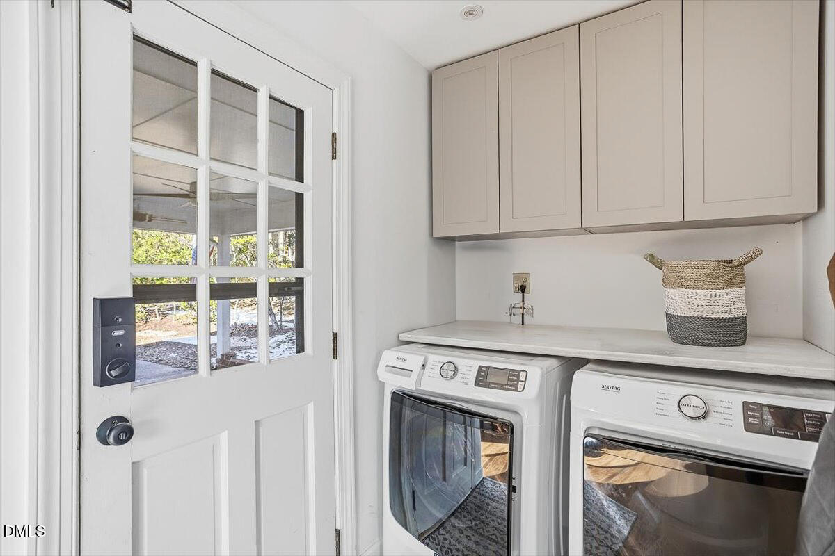 5904 Volant Drive Raleigh, NC 27609 - Photo 20 of 42 a utility room with dryer and washer