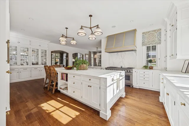 a living room with furniture fireplace and a fireplace