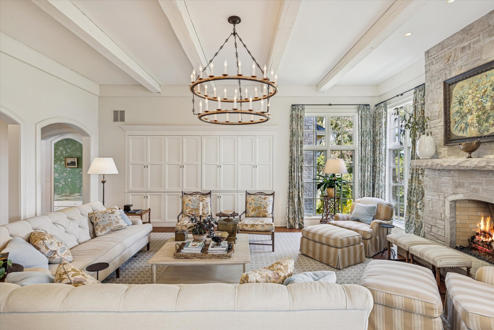 2450 Persimmon Drive St. Charles, IL 60174 - Photo 30 of 111 a living room with furniture chandelier and a fireplace