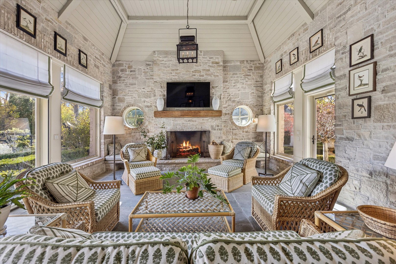 2450 Persimmon Drive St. Charles, IL 60174 - Photo 31 of 111 a living room with furniture a fireplace and a flat screen tv