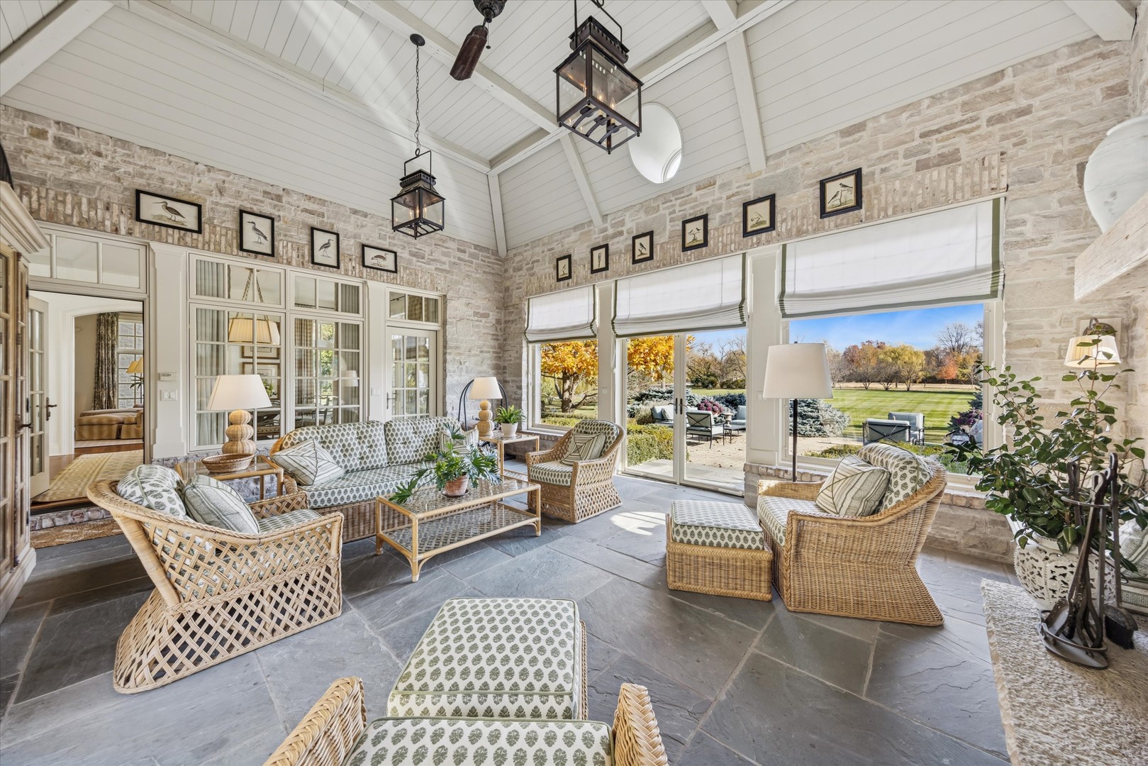 2450 Persimmon Drive St. Charles, IL 60174 - Photo 32 of 111 a living room with patio furniture and a large window