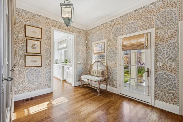 a en suite bathroom with a double vanity sink and a mirror