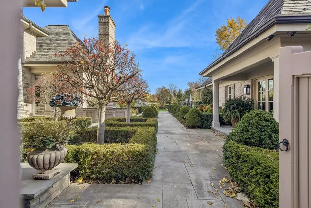 an aerial view of multiple houses with outdoor space