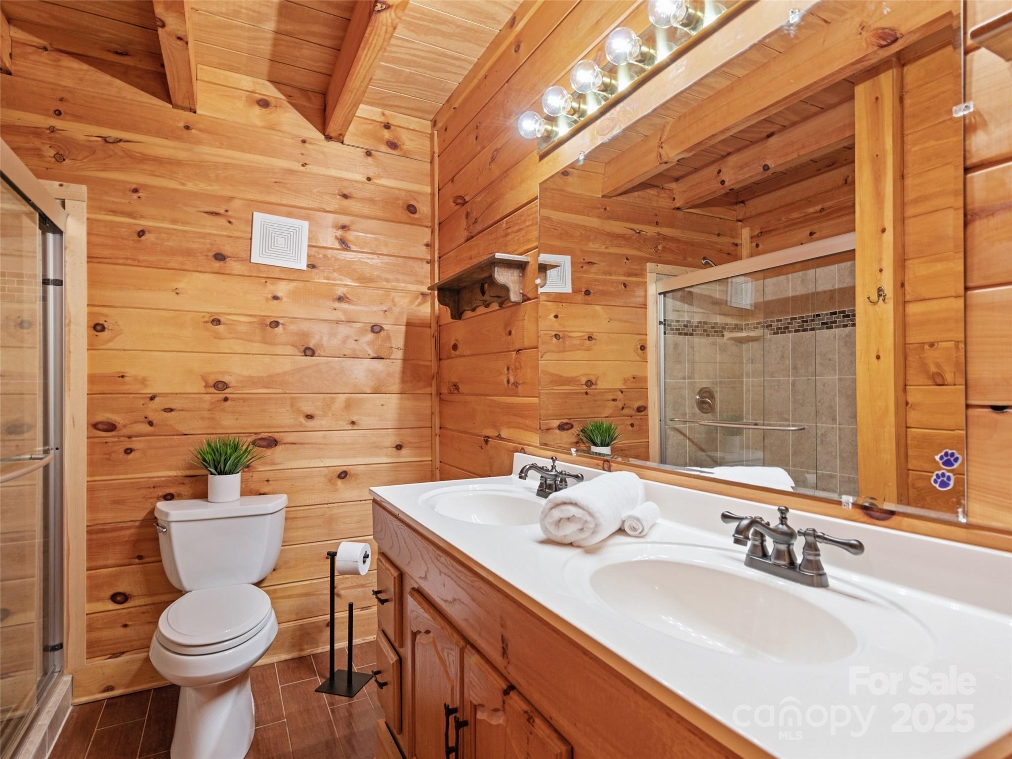 36 Wonder View Point Waynesville, NC 28785 - Photo 26 of 40 a bathroom with a sink toilet and shower