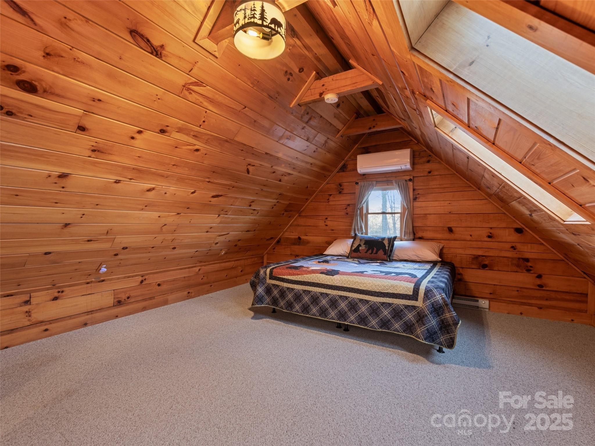 36 Wonder View Point Waynesville, NC 28785 - Photo 27 of 40 a room with a bed