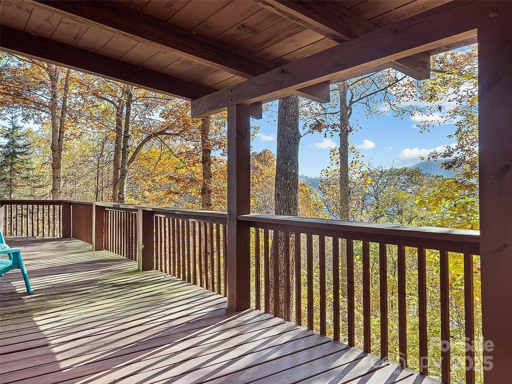 36 Wonder View Point Waynesville, NC 28785 - Photo 3 of 40 a balcony with wooden floor