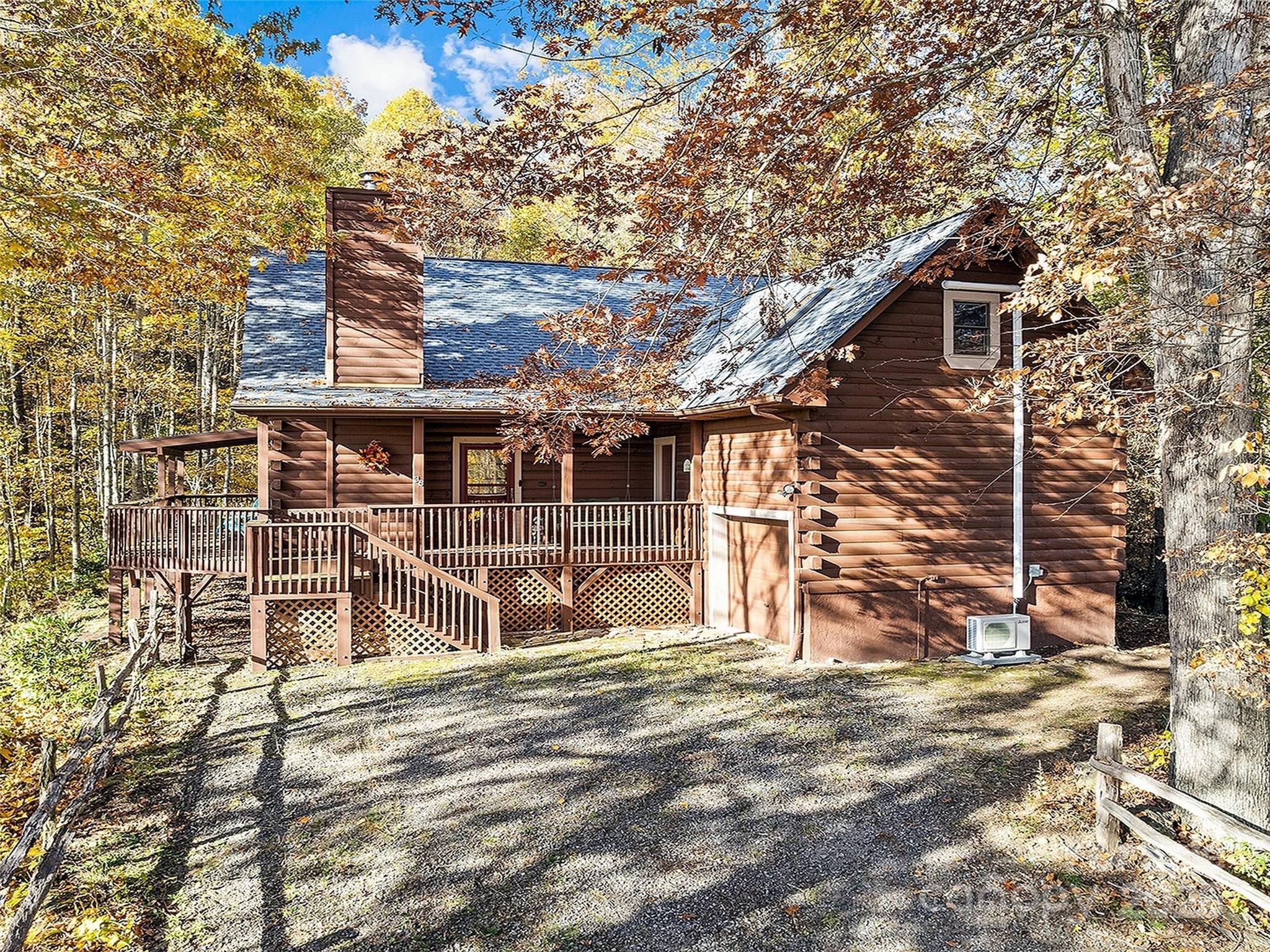 36 Wonder View Point Waynesville, NC 28785 - Photo 35 of 40 front view of a house with a large tree