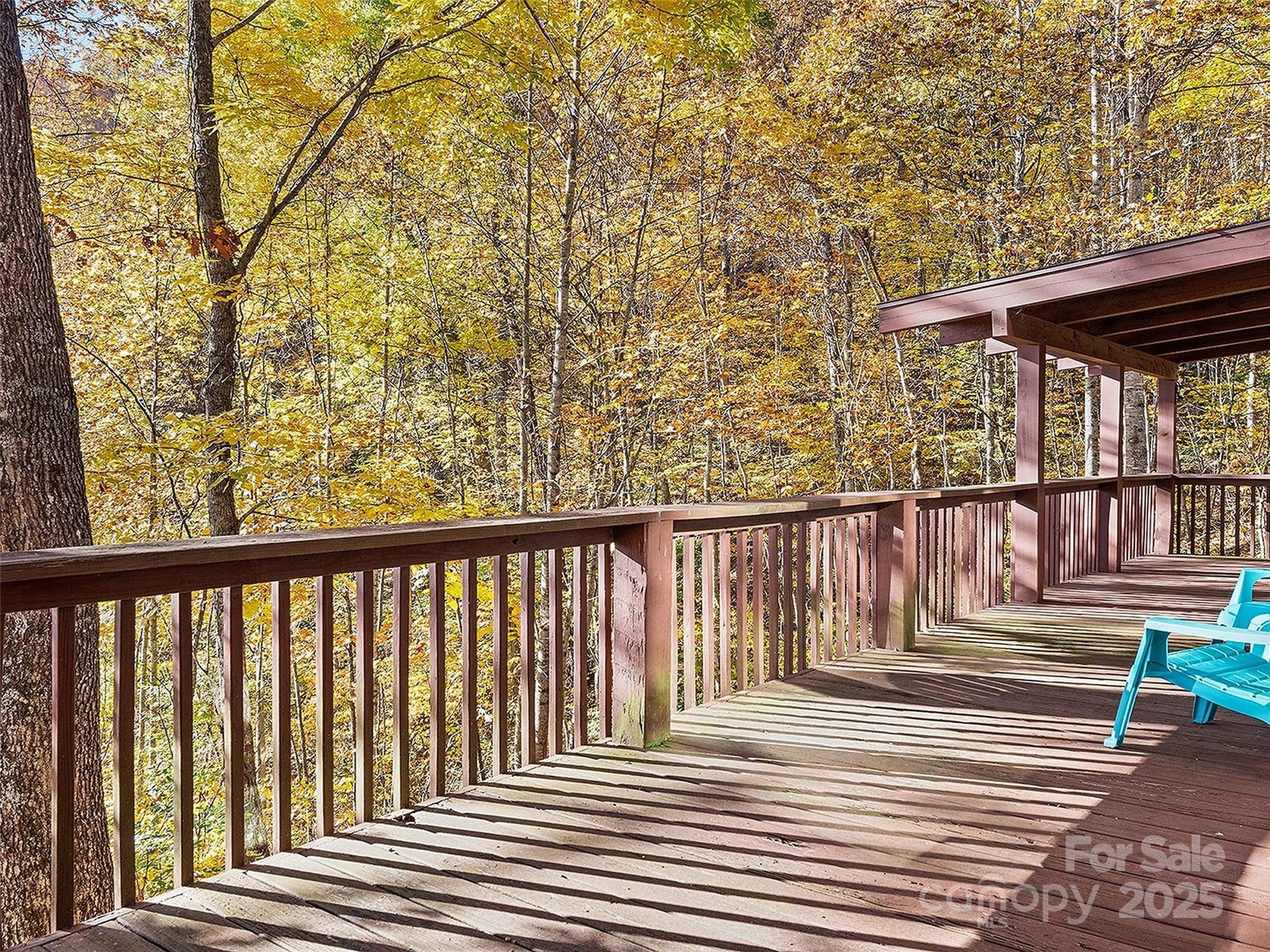 36 Wonder View Point Waynesville, NC 28785 - Photo 38 of 40 a balcony with wooden floor and fence