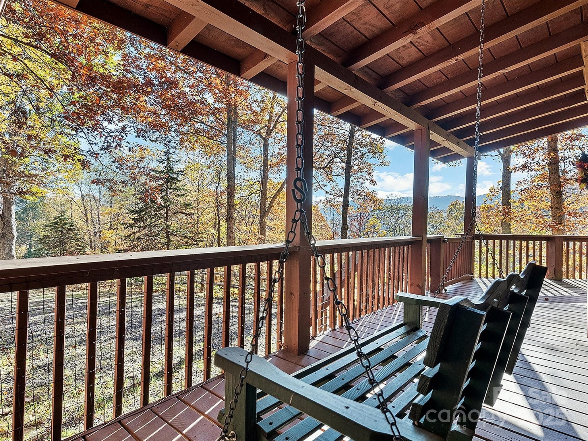 36 Wonder View Point Waynesville, NC 28785 - Photo 7 of 40 a view of a two chairs in the balcony
