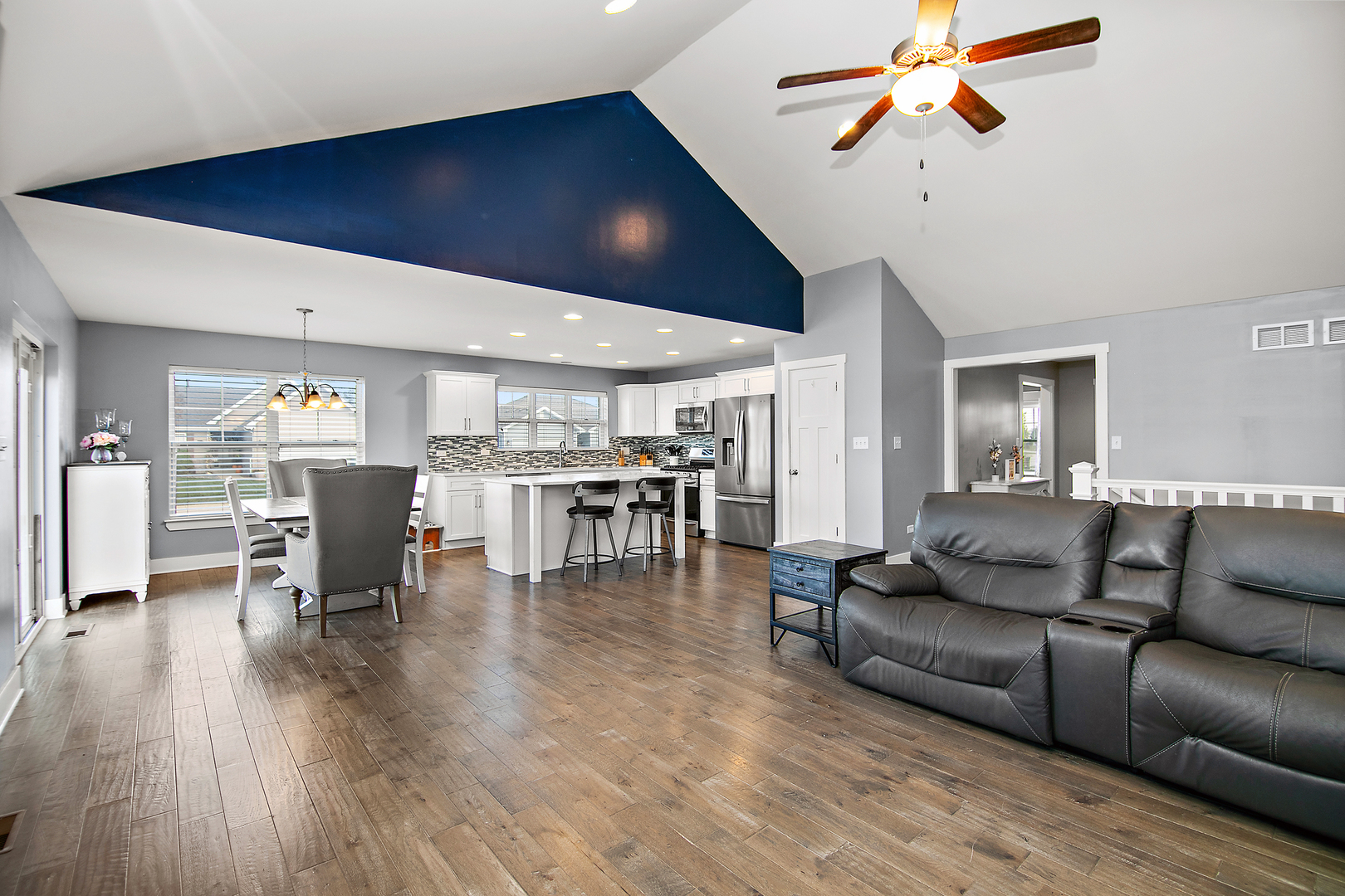 489 Cardinal Drive Manteno, IL 60950 - Photo 12 of 38 a living room with furniture and kitchen view