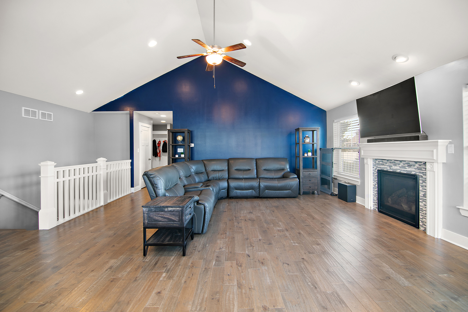 489 Cardinal Drive Manteno, IL 60950 - Photo 13 of 38 a living room with furniture and a fireplace