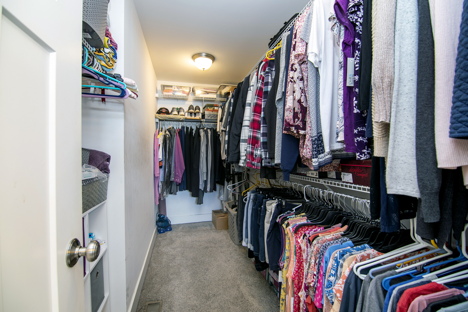 489 Cardinal Drive Manteno, IL 60950 - Photo 20 of 38 a view of walk in closet with clothes and shoes