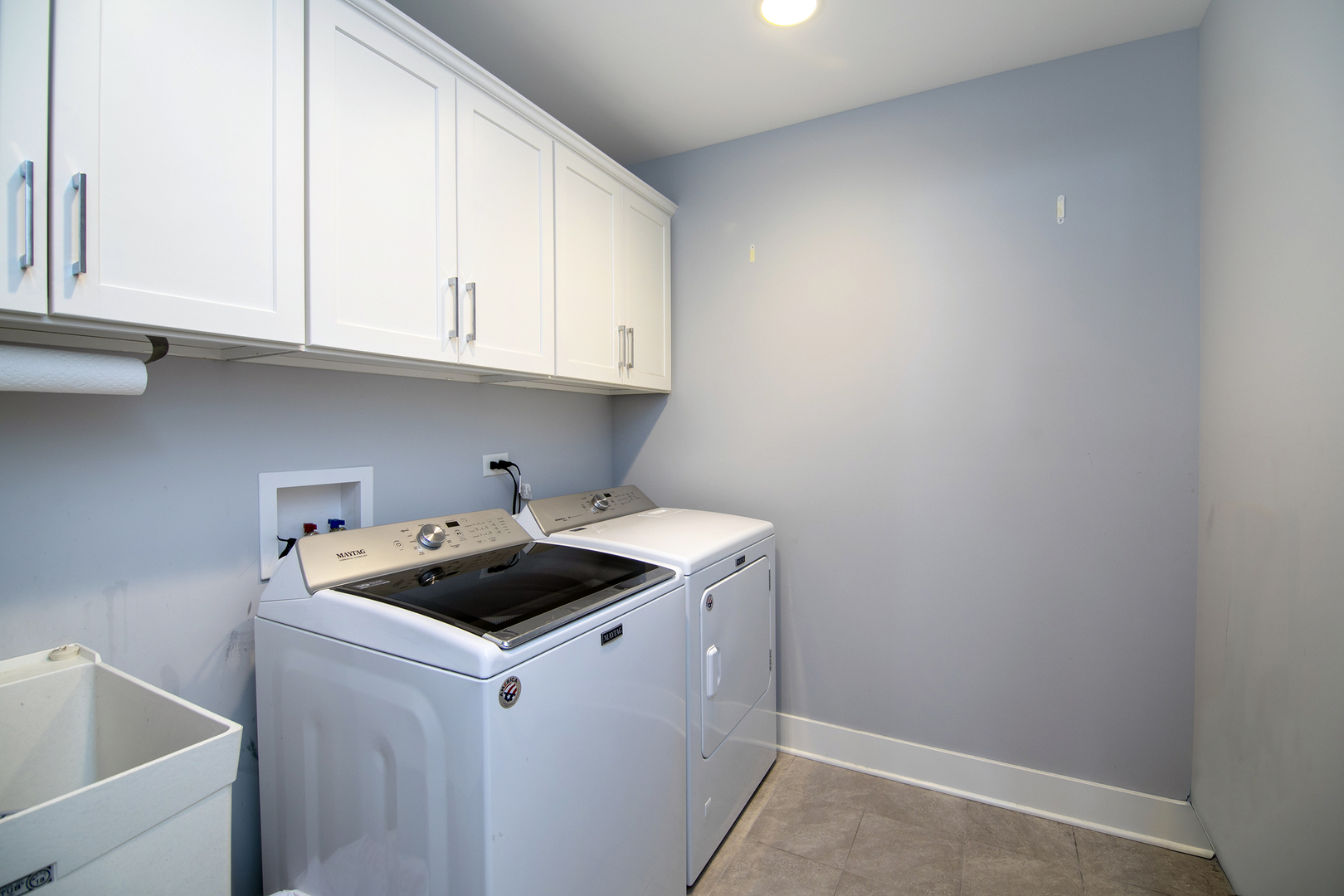 489 Cardinal Drive Manteno, IL 60950 - Photo 24 of 38 a kitchen with a sink and cabinets
