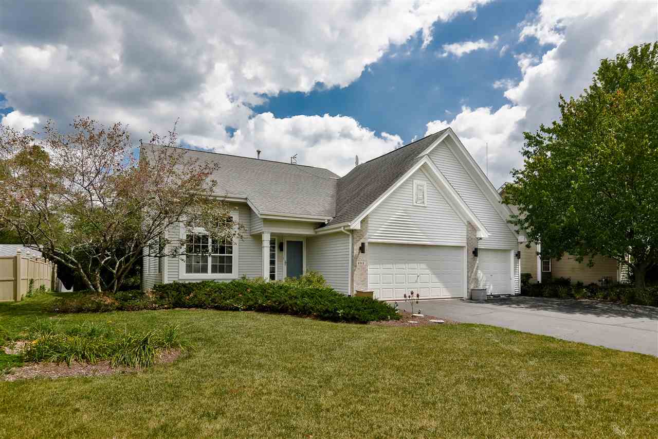 693 Bayfield Road Rockton, IL 61073 - Photo 2 of 26 a view of a house with backyard and garden