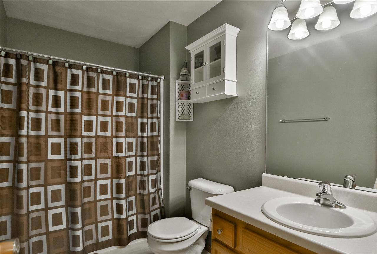693 Bayfield Road Rockton, IL 61073 - Photo 23 of 26 a bathroom with a sink a toilet and shower