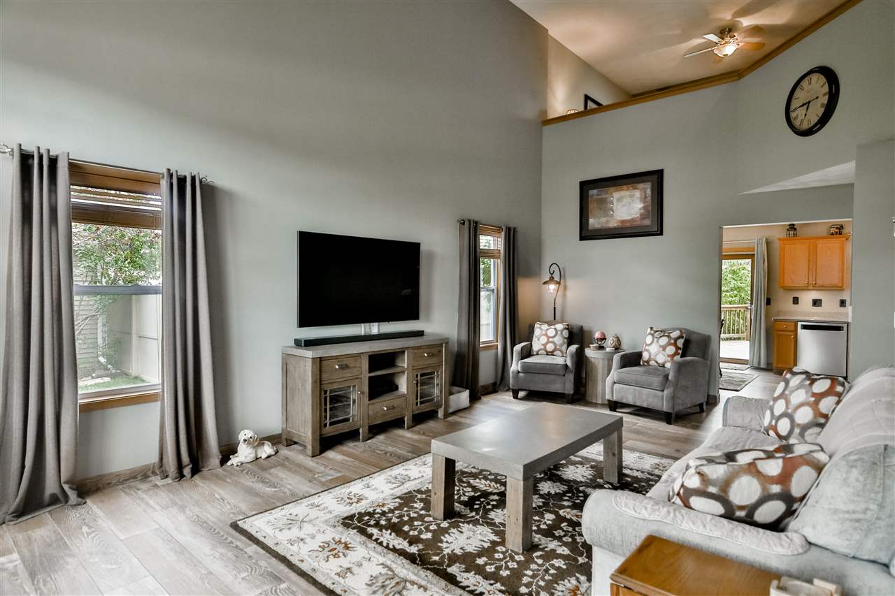 693 Bayfield Road Rockton, IL 61073 - Photo 3 of 26 a living room with furniture and a flat screen tv