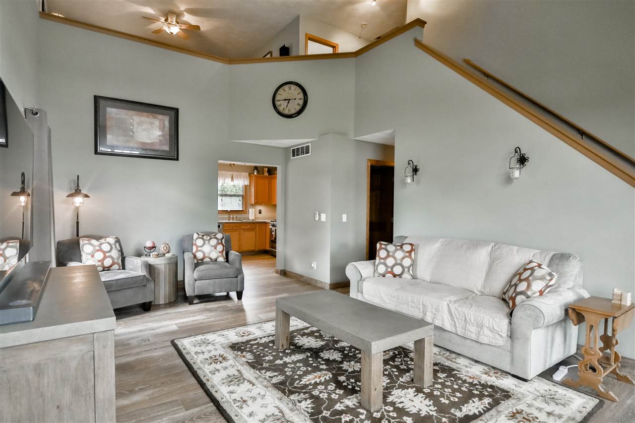 693 Bayfield Road Rockton, IL 61073 - Photo 4 of 26 a living room with furniture and wooden floor