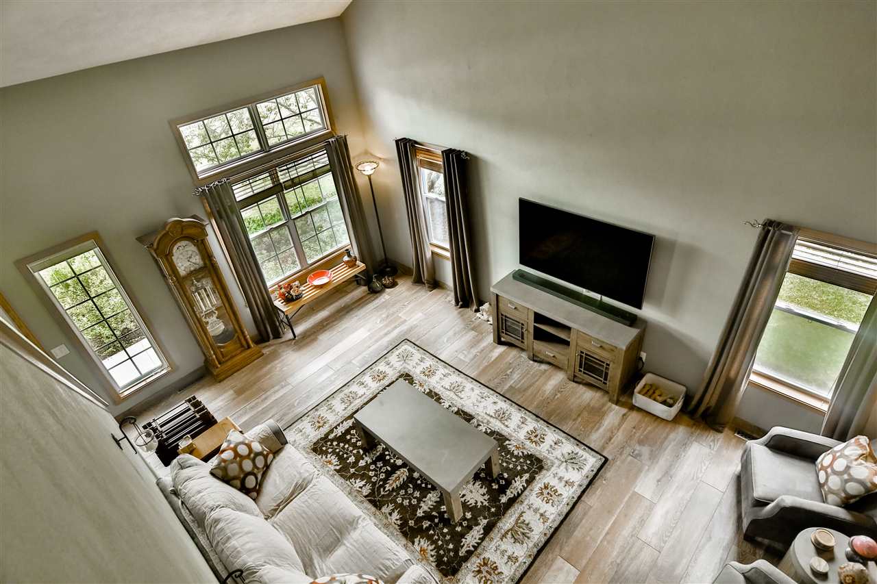 693 Bayfield Road Rockton, IL 61073 - Photo 6 of 26 a living room with furniture and a flat screen tv