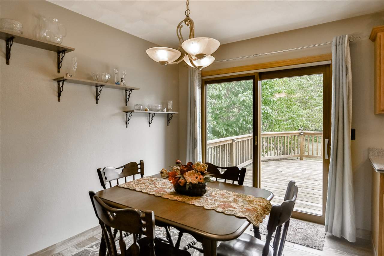 693 Bayfield Road Rockton, IL 61073 - Photo 10 of 26 a view of a dining room with furniture window and outside view