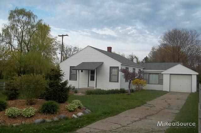 5831 Lakeshore Road Lexington, MI 48450 - Photo 1 of 15 Nicely landscaped, easy to maintain.
