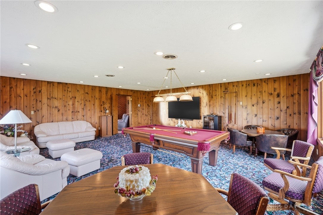 5669 O Neall Road Waynesville, OH 45068 - Photo 32 of 72 This vibrant recreation space offers ample room for games and relaxation.
