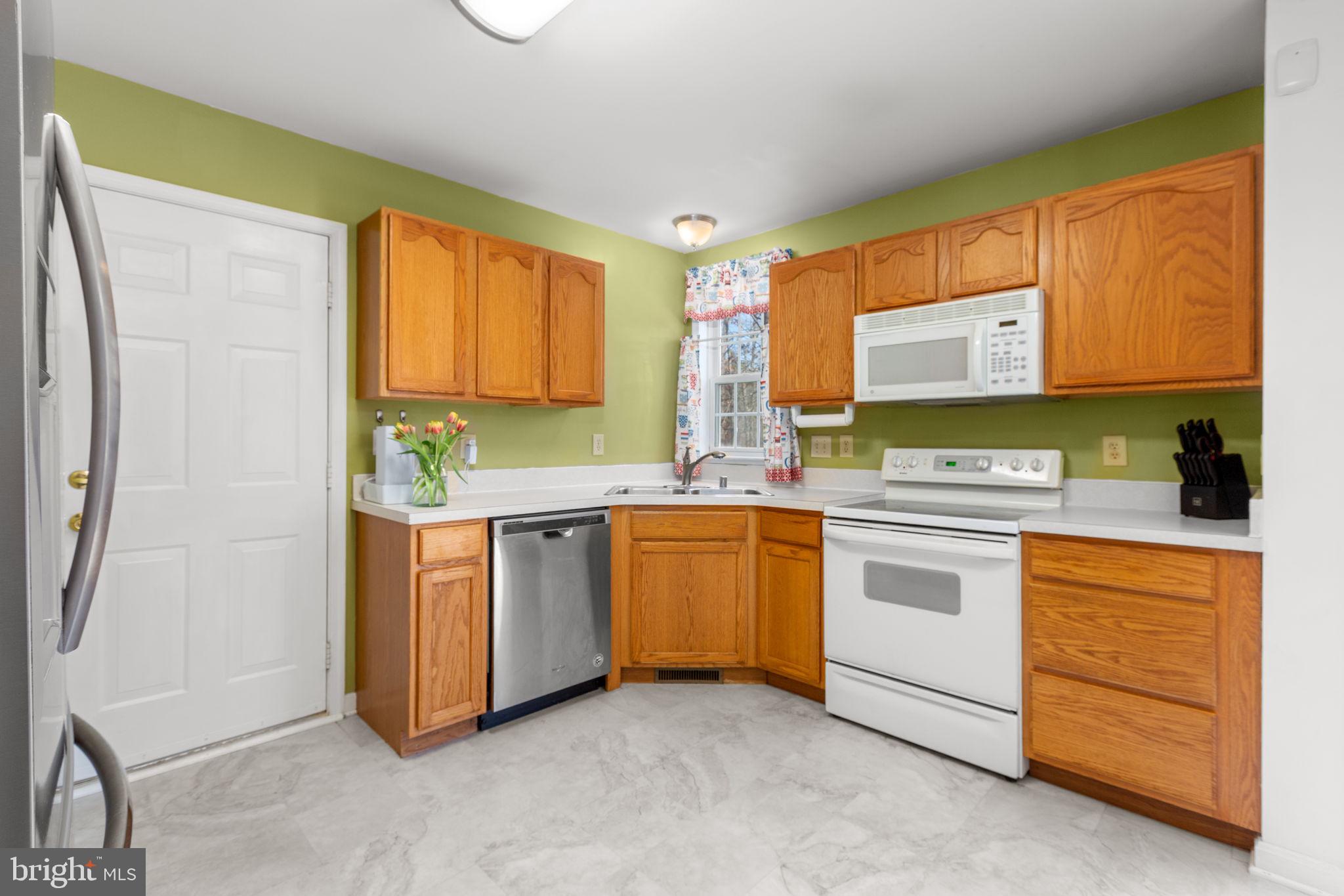 3421 Lancaster Ring Road Fredericksburg, VA 22408 - Photo 12 of 45 Kitchen opens to oversized one car garage