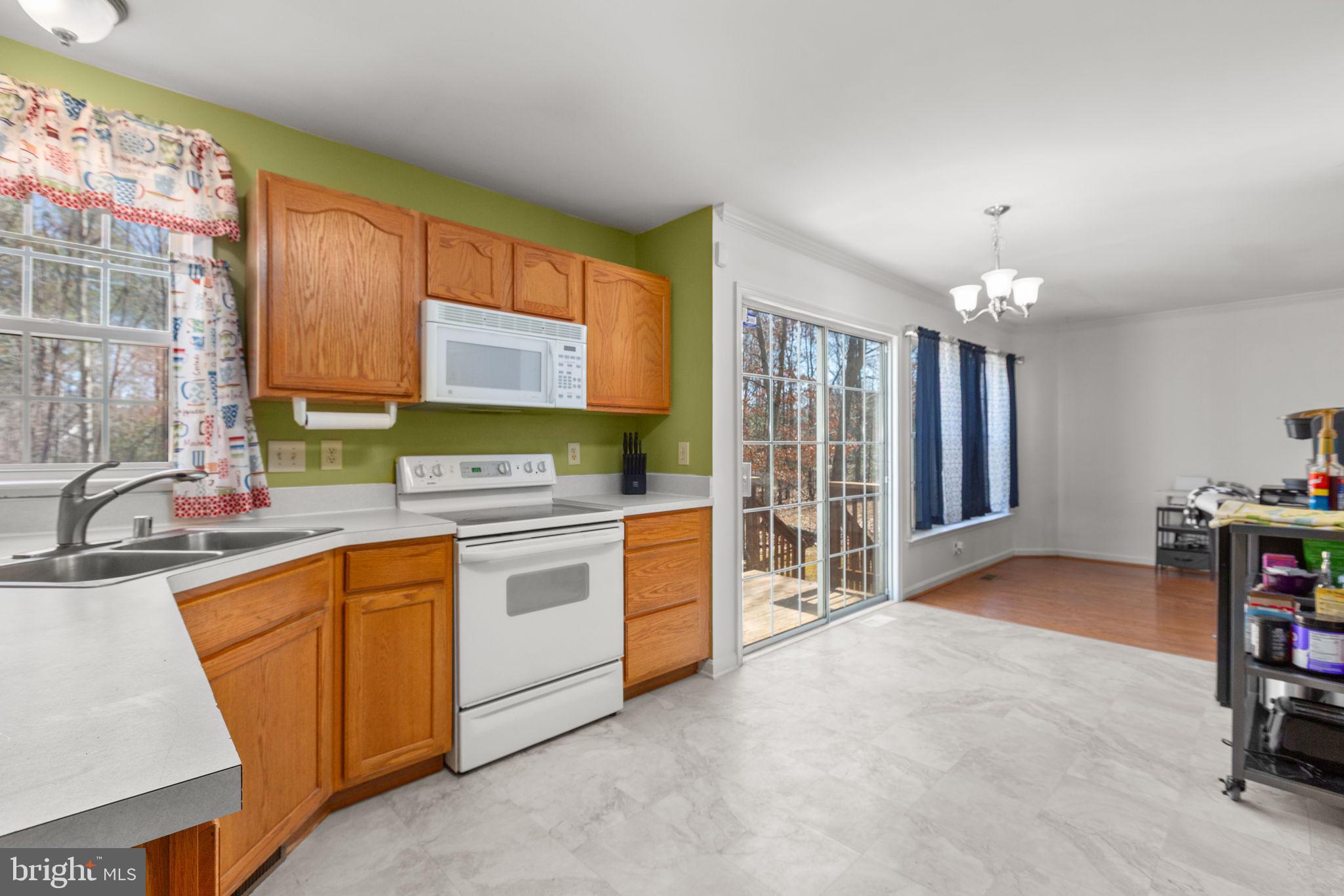 3421 Lancaster Ring Road Fredericksburg, VA 22408 - Photo 14 of 45 Kitchen opens to rear deck