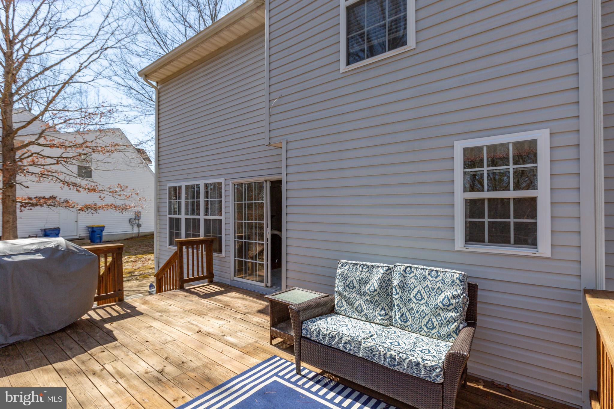 3421 Lancaster Ring Road Fredericksburg, VA 22408 - Photo 18 of 45 Deck offers steps to wooded rear lot