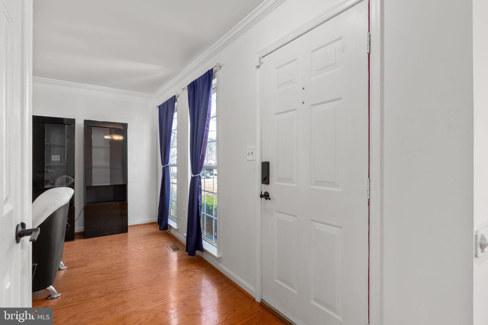 3421 Lancaster Ring Road Fredericksburg, VA 22408 - Photo 6 of 45 Foyer opens hardwoods to living & dining rooms