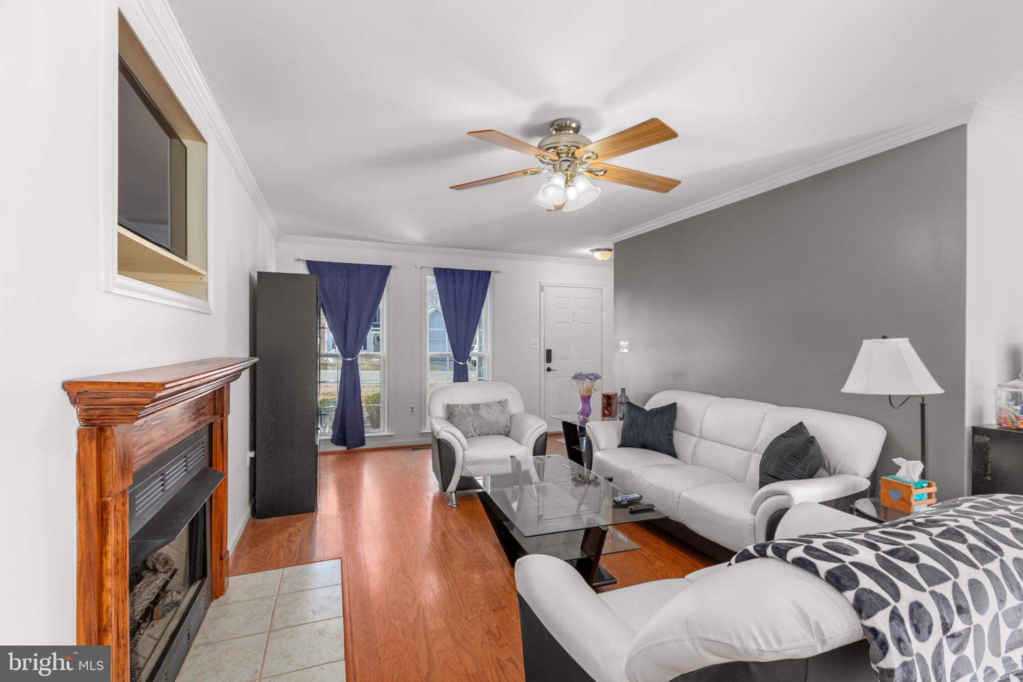 3421 Lancaster Ring Road Fredericksburg, VA 22408 - Photo 8 of 45 Light & bright living room features ceiling fan