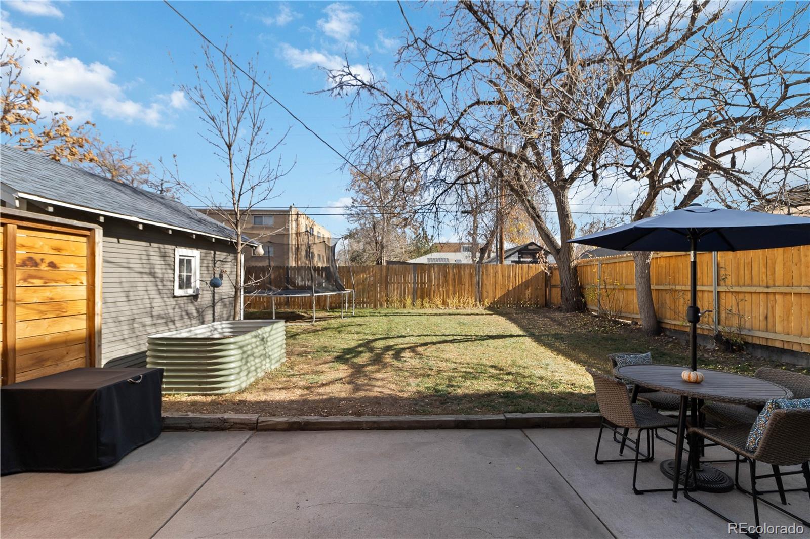 1620 Galena Street Aurora, CO 80010 - Photo 27 of 34 a view of swimming pool with outdoor seating