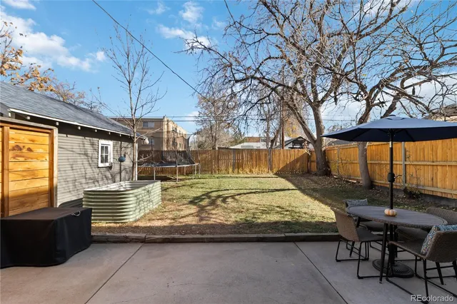 a view of swimming pool with outdoor seating