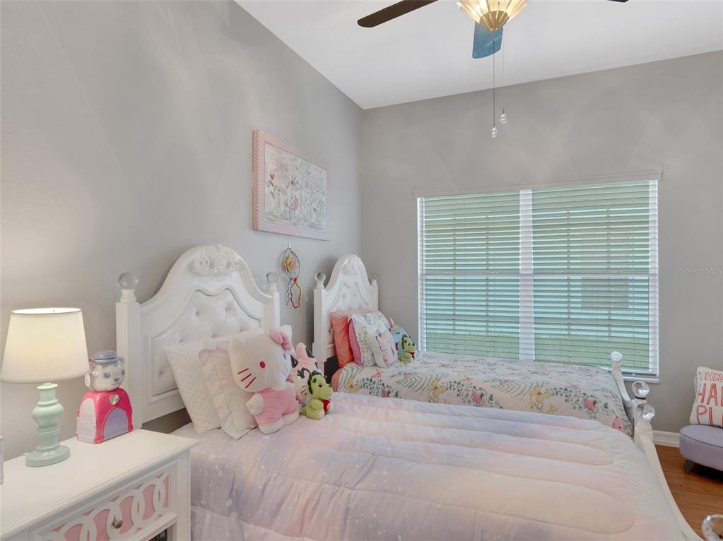 411 Ridge View Drive Davenport, FL 33837 - Photo 11 of 24 a bedroom with a bed and a window
