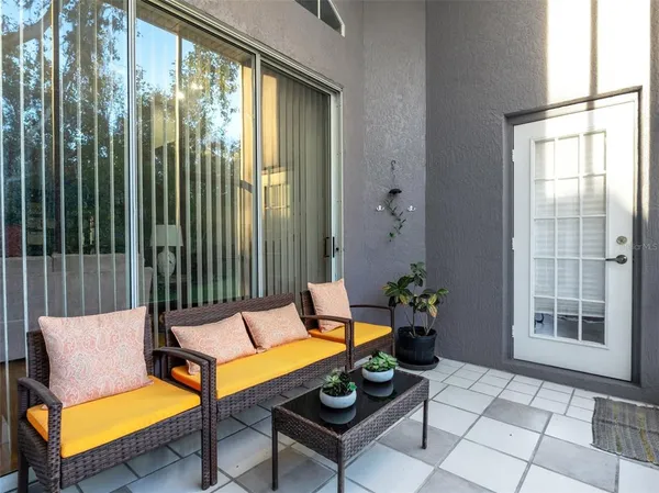 a building outdoor space with patio furniture
